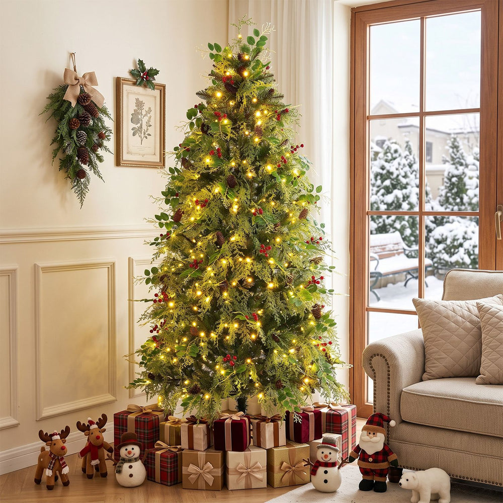 Decorated 6 FT pre-lit artificial Christmas tree with warm white and multicolor LED lights, pine cones, and red berries.