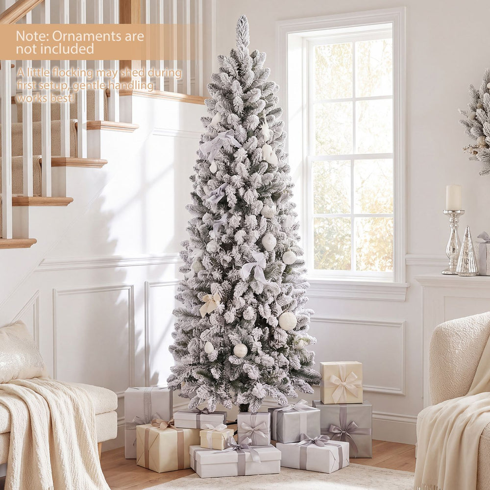 Snow-flocked 6 FT pre-lit Christmas tree with RGB lights, featuring adjustable brightness and a slim design for any corner.