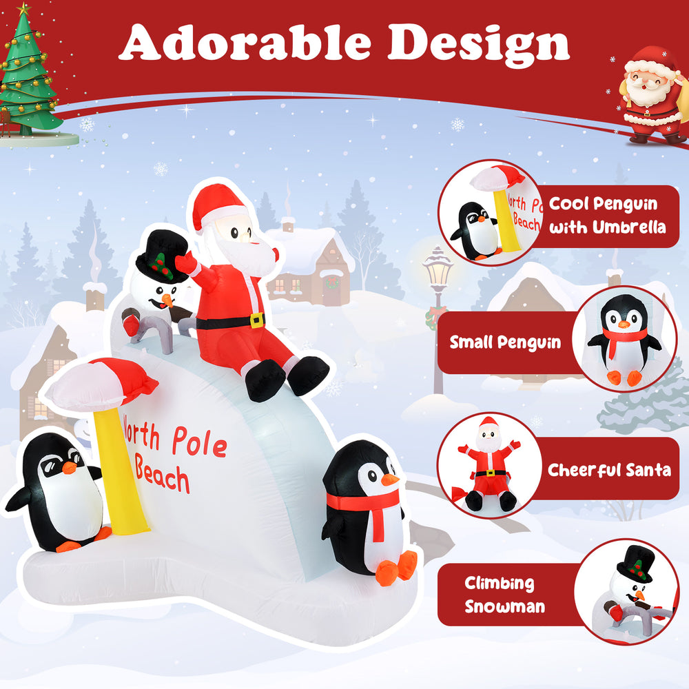 6-foot Christmas inflatable featuring Santa and penguins on an ice slide, perfect for festive outdoor decoration.