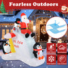 6-foot Christmas inflatable featuring Santa and penguins on an ice slide, water-resistant for outdoor festive decor.
