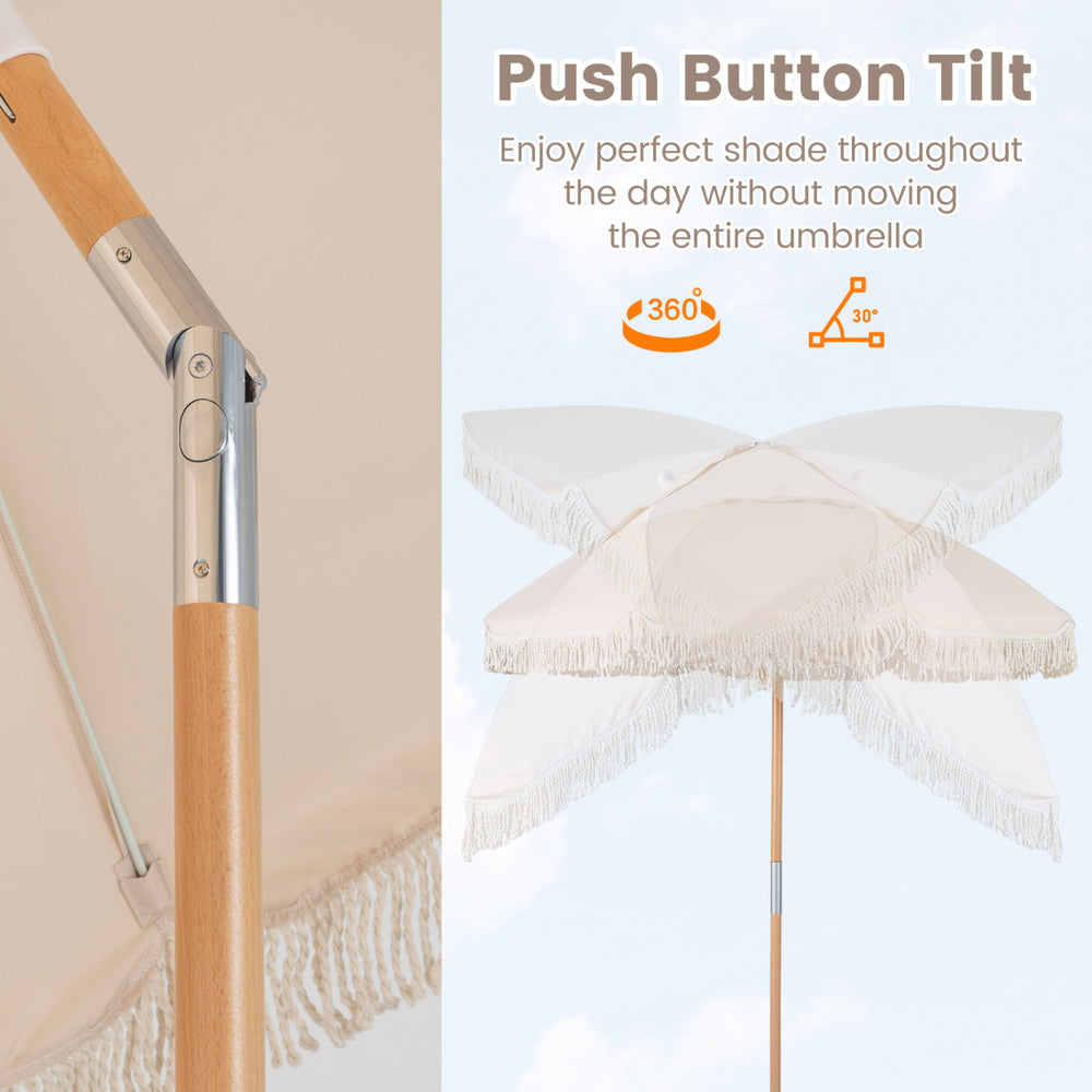 Close-up of the 6 feet white patio umbrella with fringe, featuring a wood pole and push button tilt for adjustable.