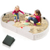 Top view of the 6 feet kids oval sandbox with sand, built-in corner seats, and dust-proof cover for outdoor enjoyment.