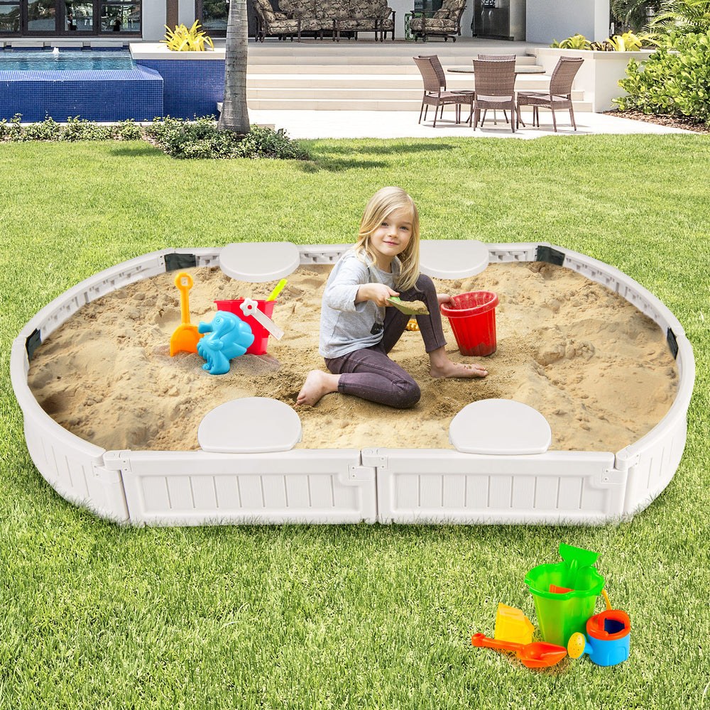 6 feet kids oval sandbox in white with a bottomless design for drainage, perfect for outdoor creativity and fun.