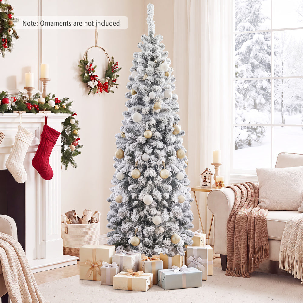 Snow flocked 6 feet unlit pencil Christmas tree with 500 branch tips, perfect for small corners during holiday celebrations.
