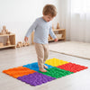 Colorful interlocking sensory mats for kids, featuring raised textures for tactile play and safe, soft TPE material.