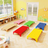 Multicolor portable daycare cots in a classroom setting, featuring sturdy design and non-slip foot pads for kids'.