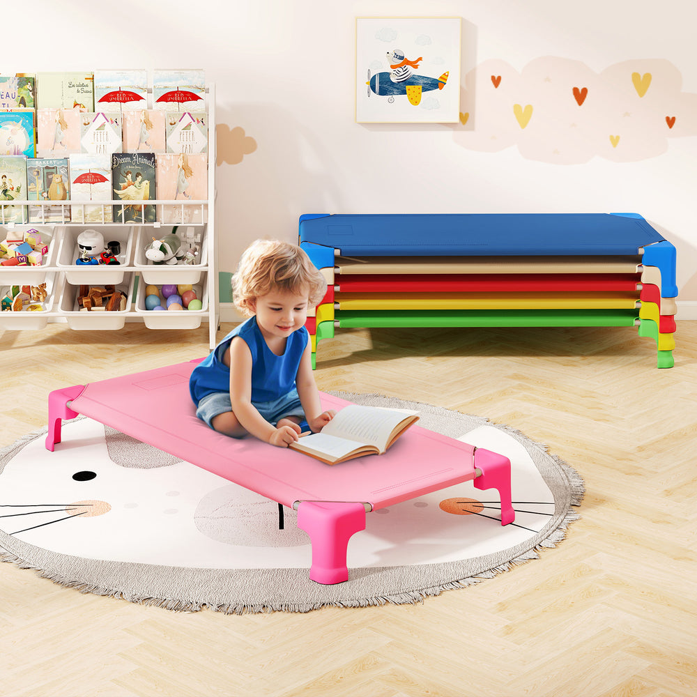 Multicolor stackable daycare cots for kids, featuring sturdy metal pipes and non-slip foot pads, ideal for nap time.