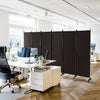 Six-panel rolling room divider in walnut with woven surface, ideal for privacy in home or office spaces.