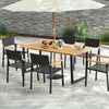 Rectangular 6-person acacia wood outdoor dining table with 2-inch umbrella hole, set in a patio setting.