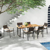 Rectangular 6-person acacia wood outdoor dining table with a 2-inch umbrella hole, set in a stylish patio setting.