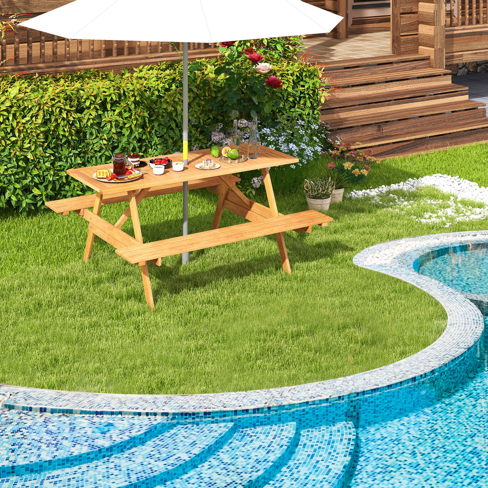 Rectangular 6-person picnic table set in natural wood with built-in benches, ideal for poolside gatherings.