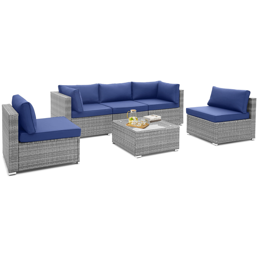 6-piece patio conversation sofa set with navy cushions, featuring a tempered glass coffee table for outdoor relaxation.