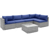 L-shaped 6 piece patio conversation sofa set with navy cushions and tempered glass coffee table for outdoor relaxation.