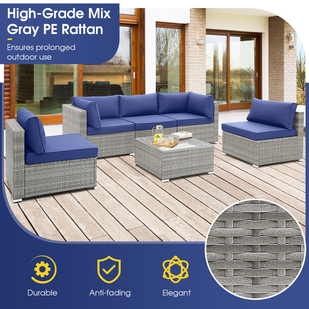 L-shaped 6 piece patio conversation sofa set in gray PE rattan with navy cushions, ideal for outdoor relaxation.