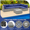 L-shaped 6-piece patio rattan furniture set with navy cushions and tempered glass coffee table for outdoor relaxation.