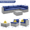 L-shaped 6 piece patio conversation sofa set with navy cushions and tempered glass coffee table, ideal for outdoor use.