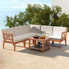 Cozy L-shaped acacia wood patio set with soft white cushions, perfect for corner placement in outdoor spaces.
