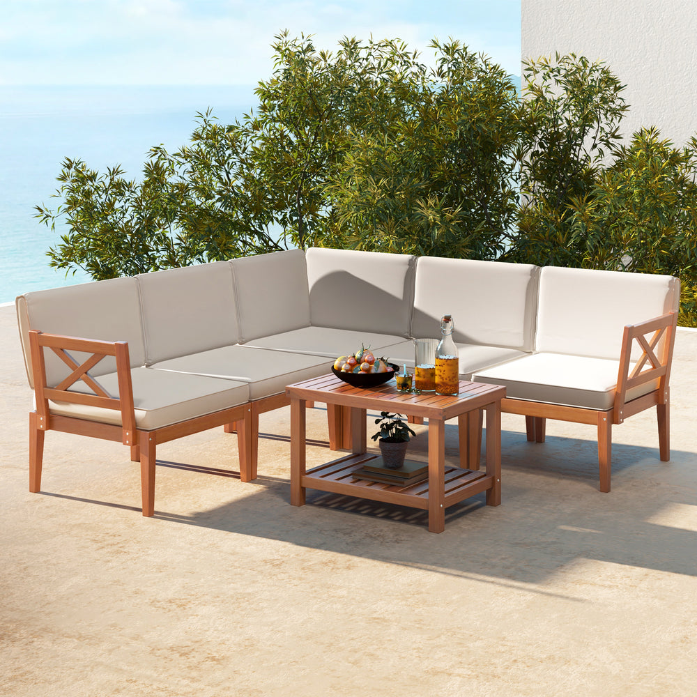 Cozy L-shaped acacia wood patio set with soft white cushions, perfect for corner placement in outdoor spaces.