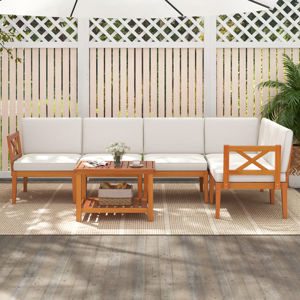 L-shaped acacia wood patio sofa with plush white cushions, designed for comfort and style in outdoor spaces.