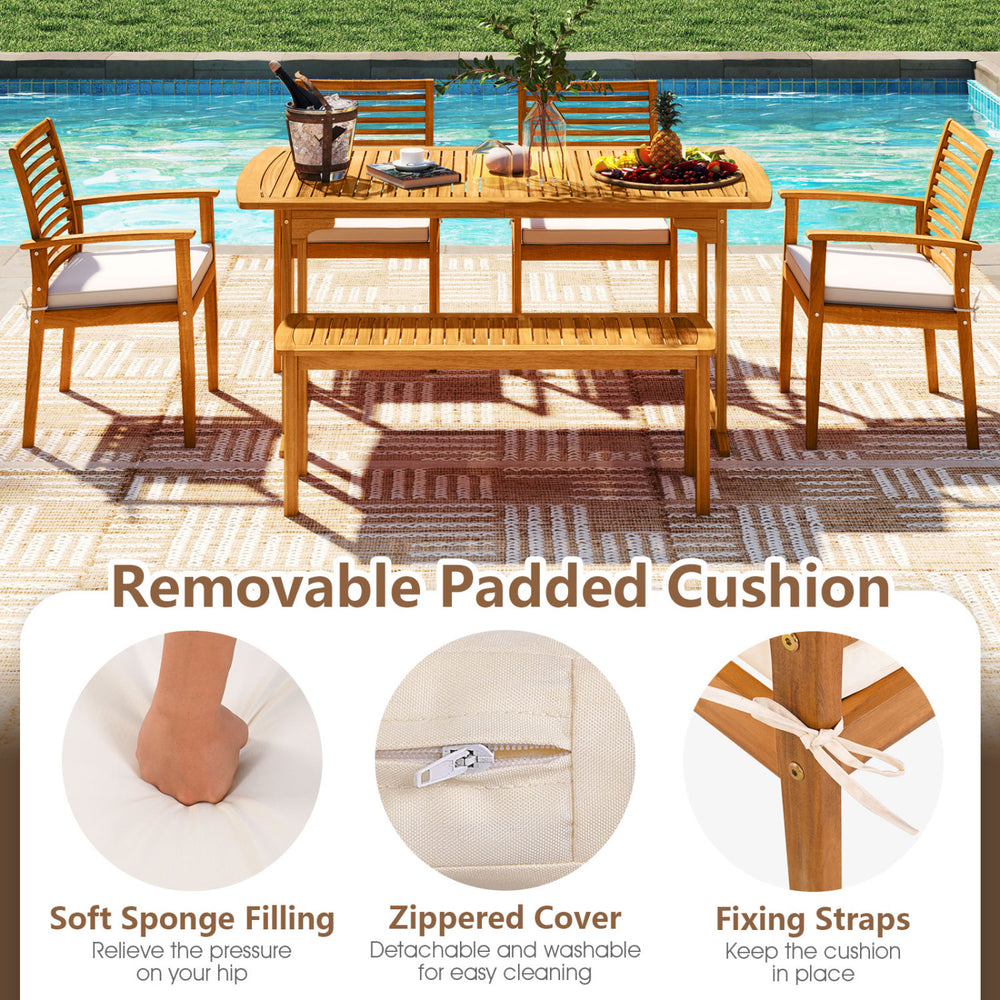 Outdoor acacia wood dining set with removable padded cushions, perfect for backyard gatherings and comfortable seating.