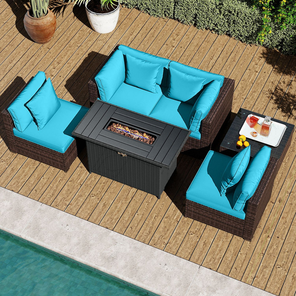 Turquoise 6-piece patio furniture set with PE rattan cushions and 50,000 BTU gas fire pit, overhead view on a patio.