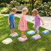 Colorful monster-themed stepping stones for kids promote balance, fine motor skills, and imaginative play in outdoor settings.