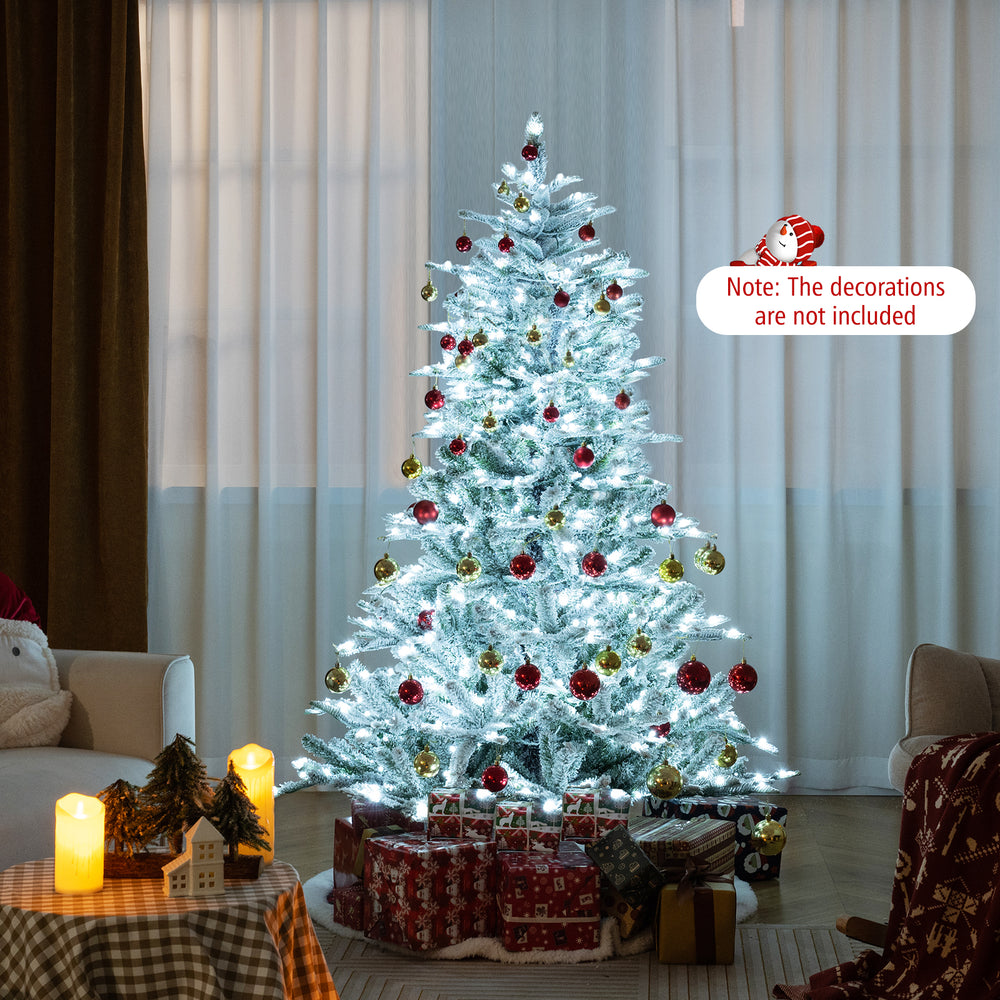 Snow flocked 6 feet artificial Christmas tree with cool white LED lights, showcasing the full-body branches and winter.