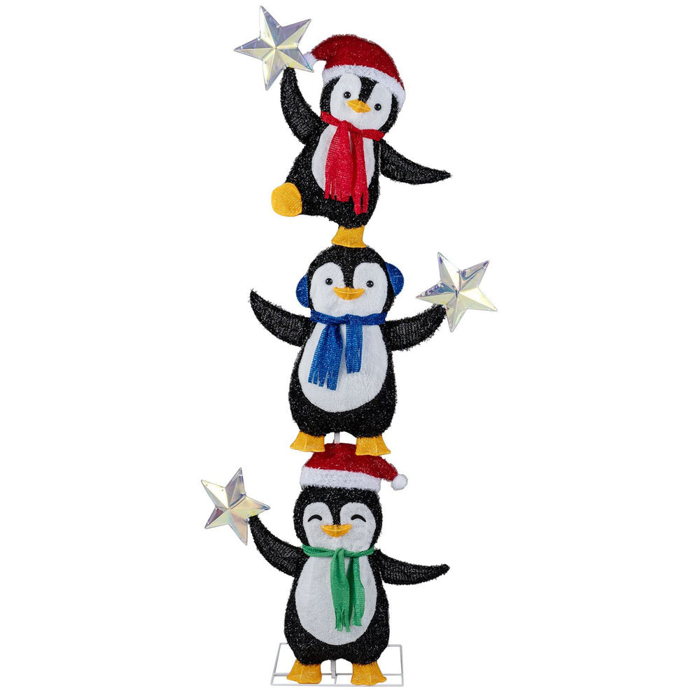 Three stacked penguins in Christmas hats and scarves, illuminated by cold white LED lights for festive yard decor.