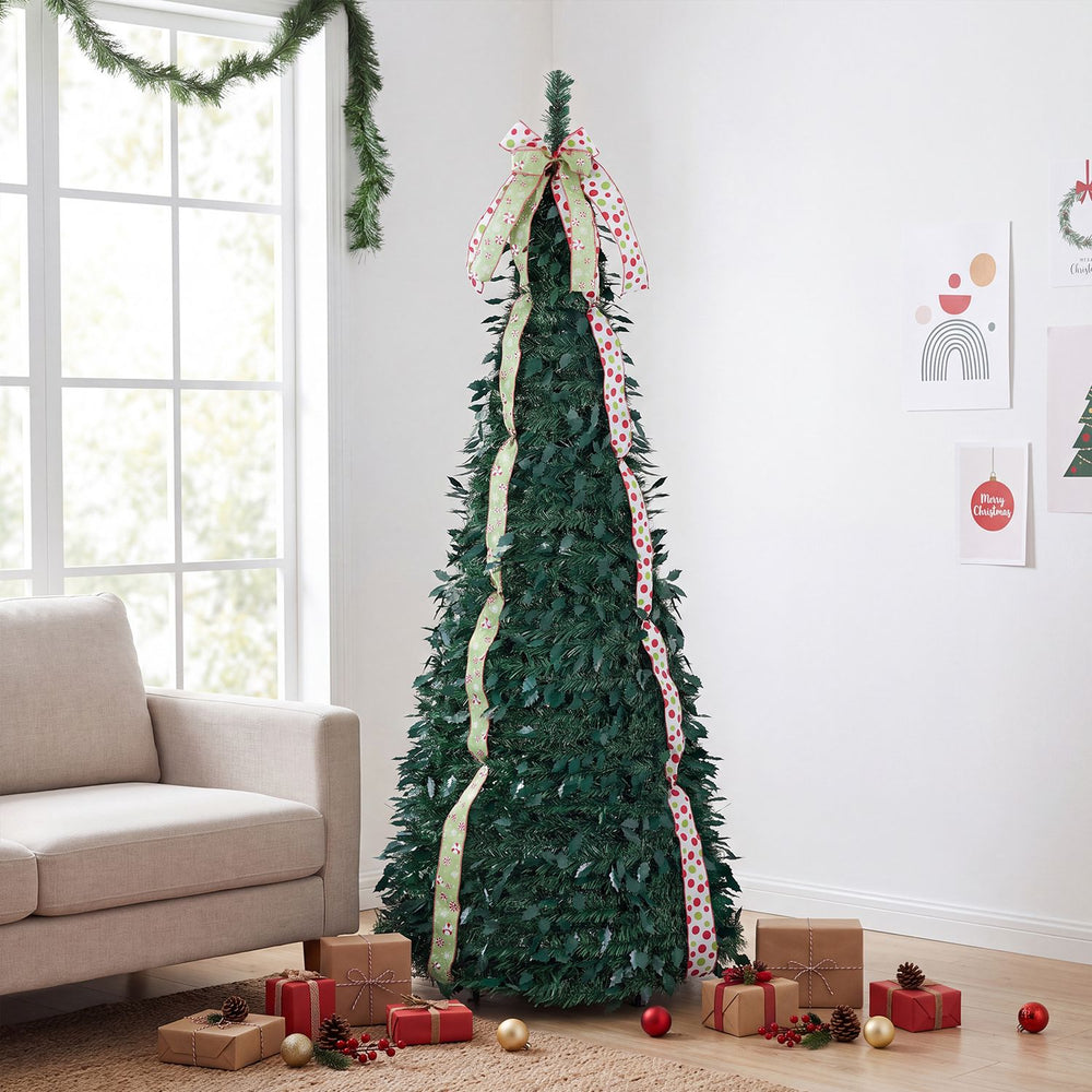 6 ft pop-up Christmas tree with PVC holly leaves, adorned with 4 festive satin ribbons and a top bow for holiday cheer.
