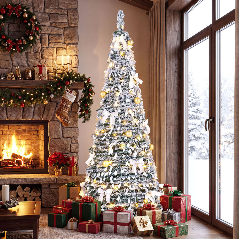 Flocked 6 ft Christmas tree adorned with 30 bows and 35 balls, pre-lit with warm white LED lights for festive decor.