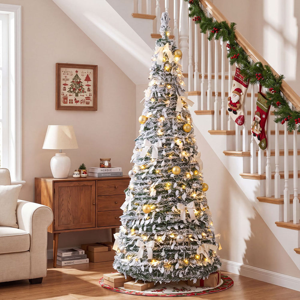 Flocked 6 ft Christmas tree with 35 golden balls and 20 bows, pre-lit with warm white LED lights for festive decor.