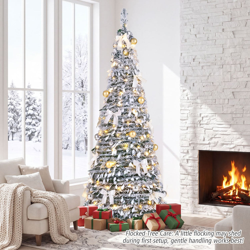 Flocked 6 ft Christmas tree with 20 bows, 35 balls, and 150 warm white LED lights for festive home decoration.