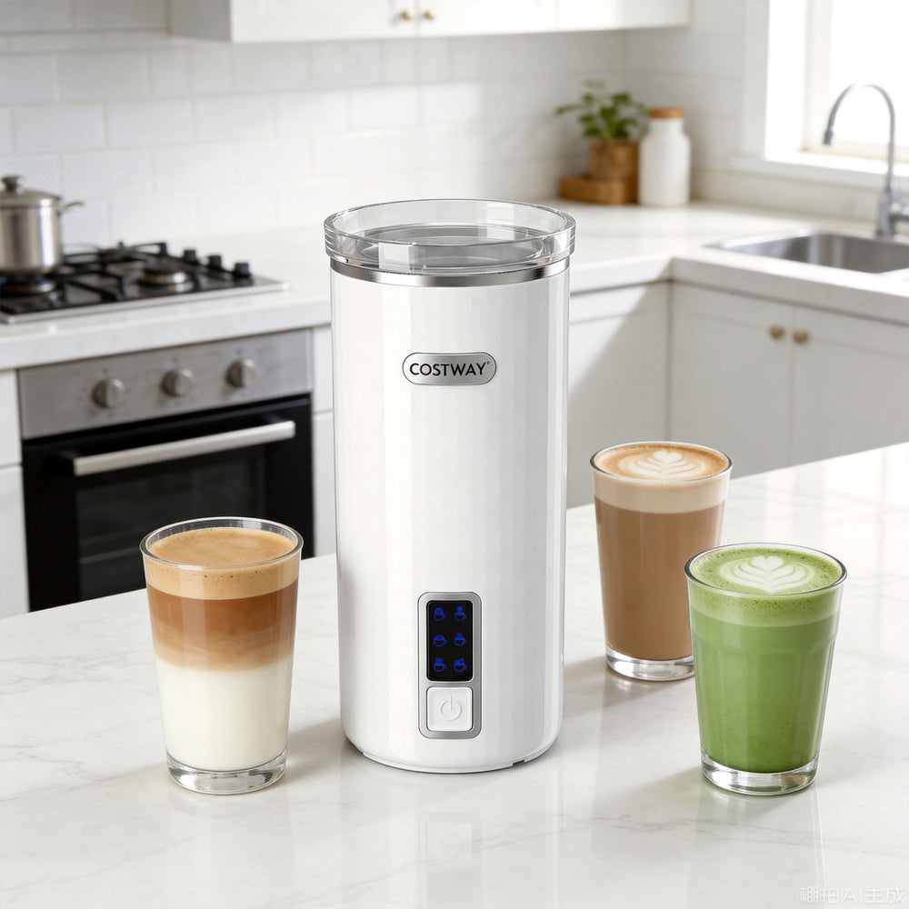 6-in-1 electric milk steamer in white with stainless steel interior, serving multiple cups of rich foam beverages.