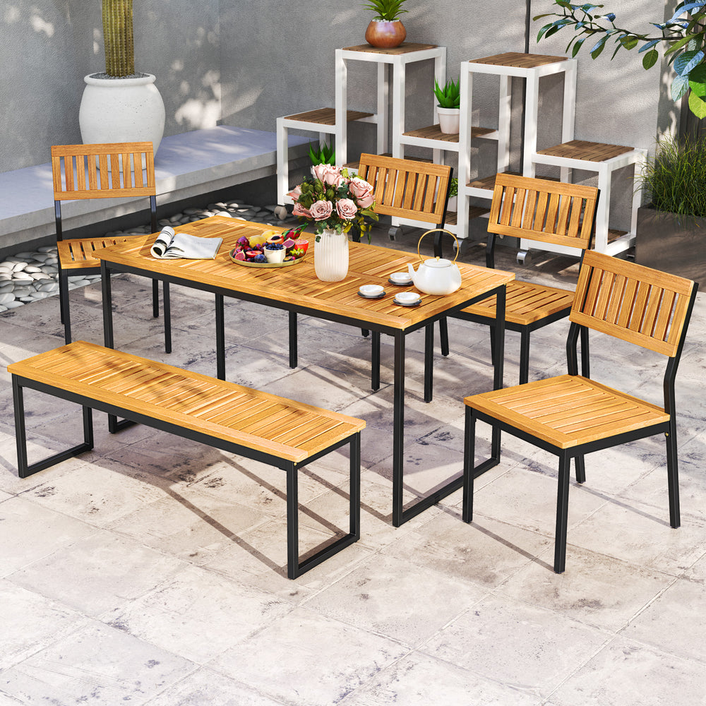 Outdoor acacia wood dining set with bench, featuring a rectangular table and ergonomic chairs, ideal for patio.
