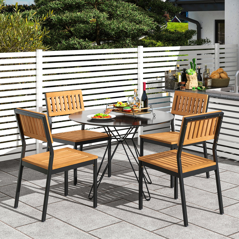 Outdoor acacia wood dining set featuring four ergonomic chairs and a rectangular table, perfect for patio gatherings.