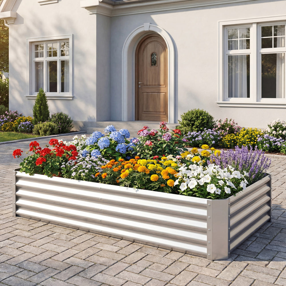 Galvanized raised garden bed with colorful flowers, featuring sturdy corrugated panels for enhanced stability and.
