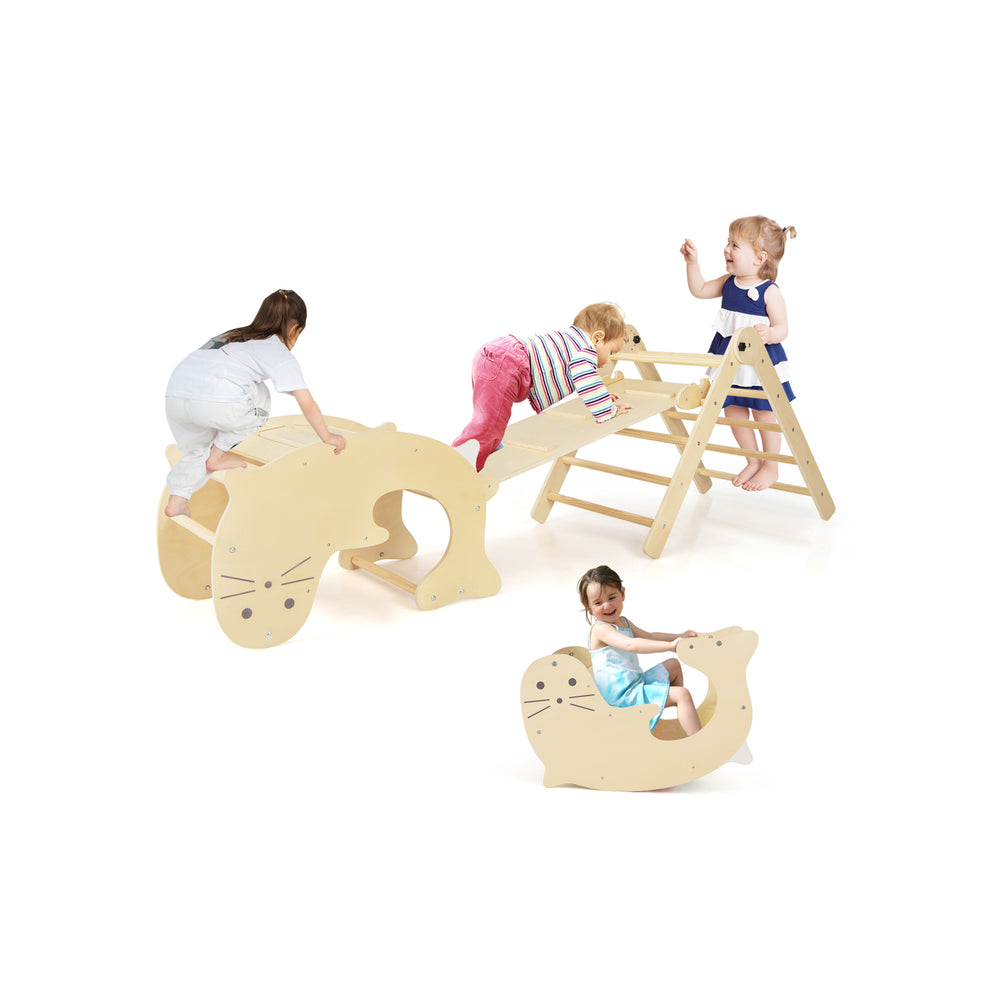Children playing on a 7-in-1 indoor climbing toy set featuring a slide, climbing ladder, and fun rocker for active play.