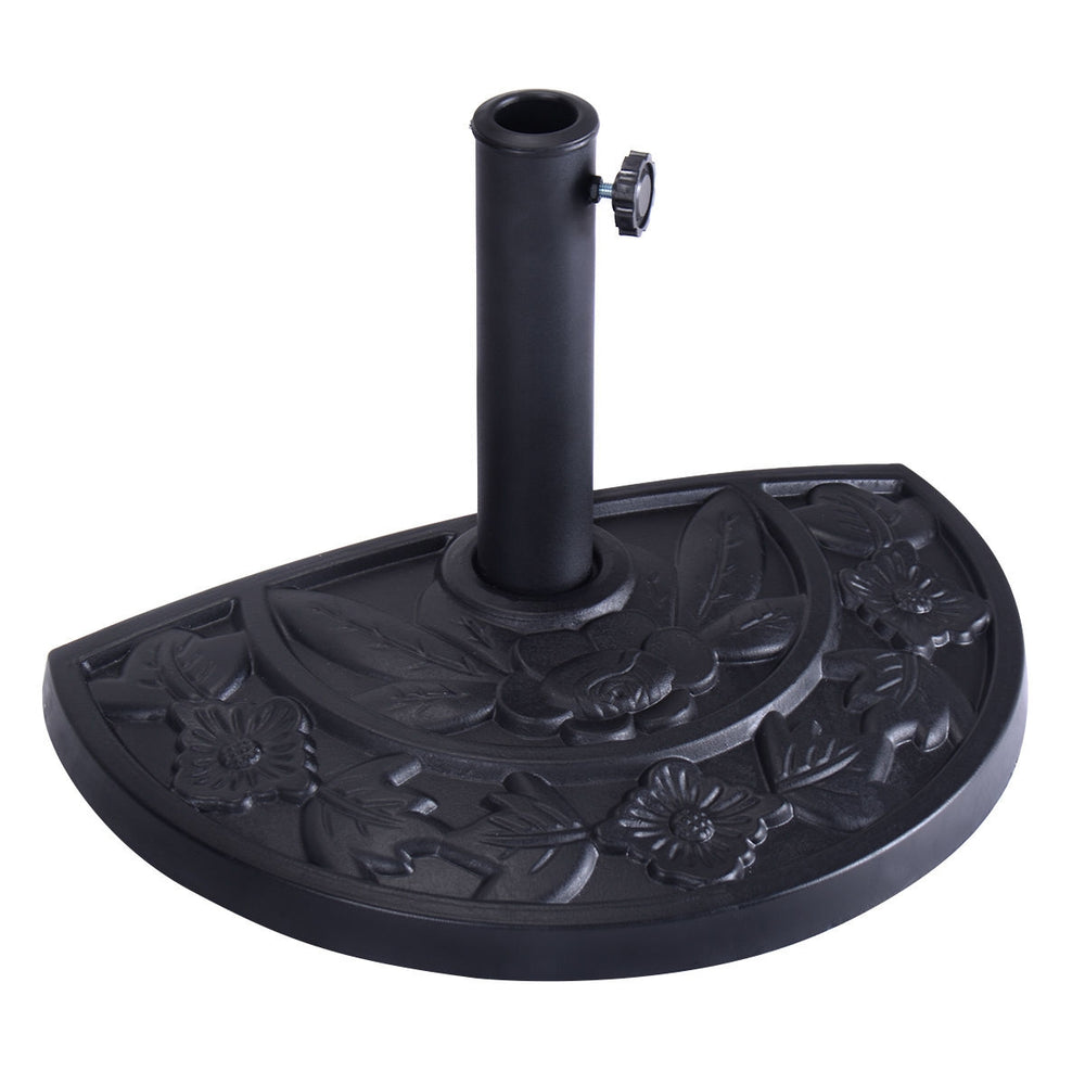 Half round patio umbrella base in antique black with decorative flower pattern, designed to securely hold umbrella.