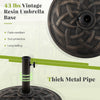 Thick metal pipe of a 43 lbs vintage resin umbrella base, fade-resistant and sun-protective for outdoor dining setups.