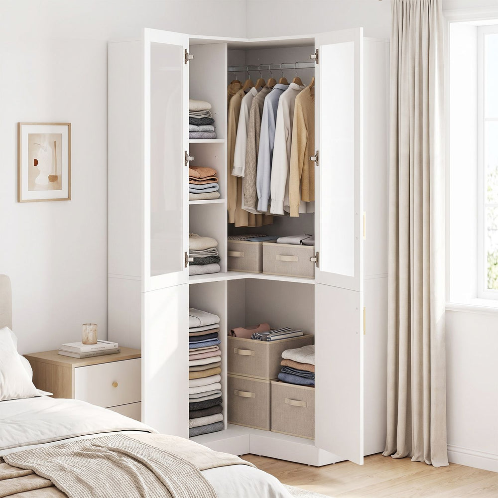 L-shaped white armoire closet with hanging rod and adjustable shelves for organized storage in compact spaces.