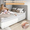 Foldable bed rail in white with adjustable safety strap, providing easy access and safety for toddlers.