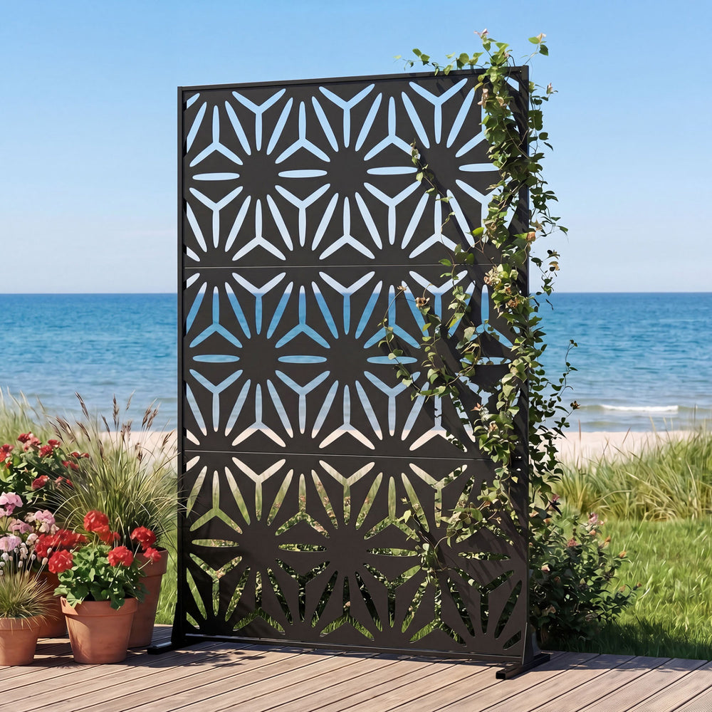 Freestanding 72"H x 48"W black fence panel with hollow-carved design, perfect for enhancing privacy on patios or.
