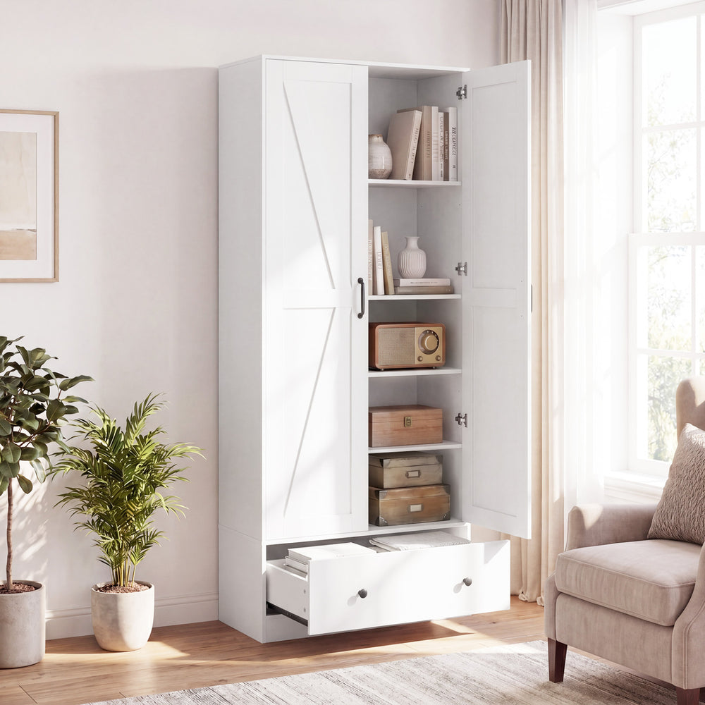 White farmhouse-style kitchen pantry cabinet with two doors, four removable shelves, and an extra drawer for storage.