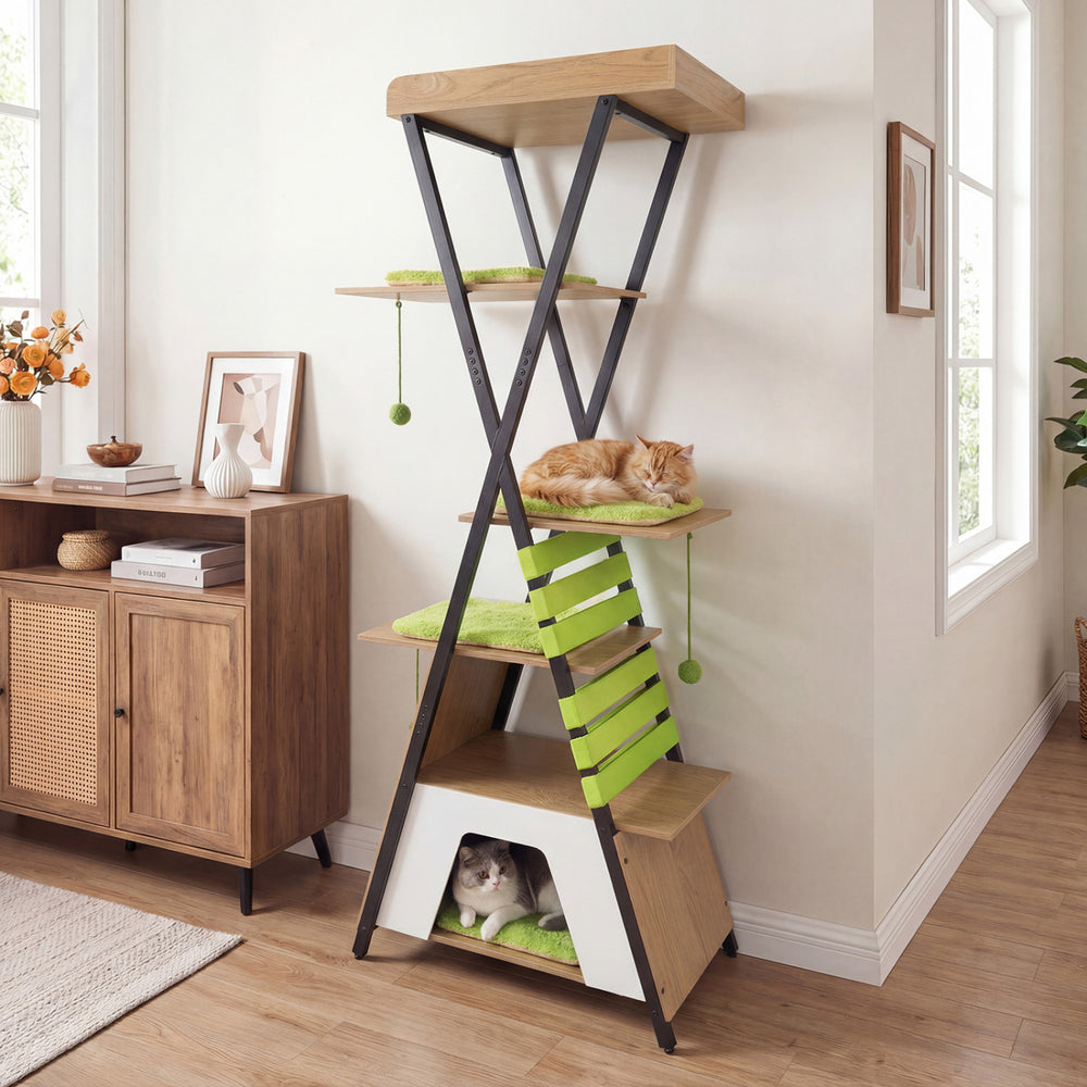 Multi-level cat tree with elevated perch, large condo, and green cushions for indoor cats, providing cozy play space.