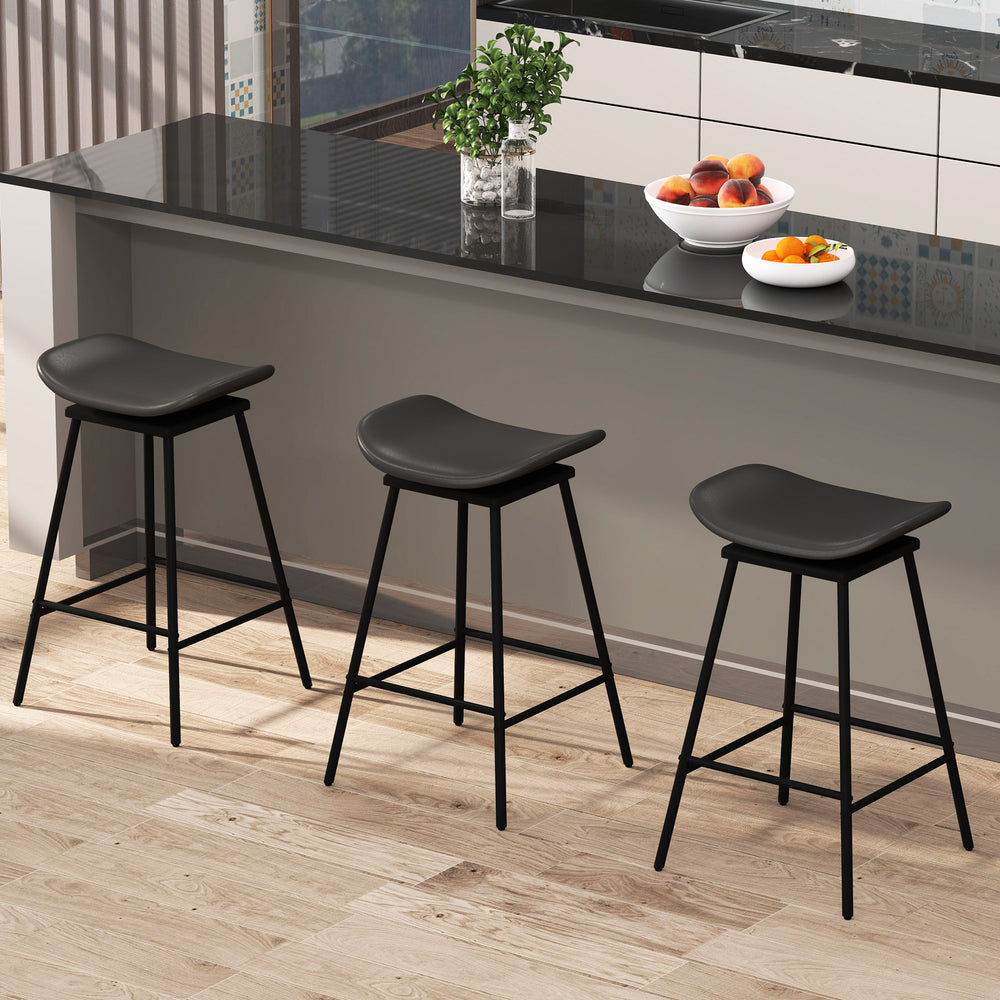 Set of 2 black swivel barstools with faux leather upholstery and footrest, ideal for kitchen islands and home bars.