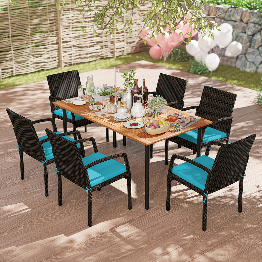 Outdoor dining set featuring a 63" acacia wood table and six turquoise-cushioned chairs, perfect for patio gatherings.