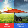9 ft orange patio umbrella with crank, UV protective and water repellent, ideal for outdoor sun and rain shelter.