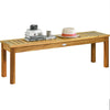 Acacia wood dining bench with hollow slat design, suitable for outdoor use, providing comfortable seating for three.