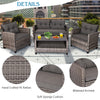 Cushioned loveseat and two single sofas in gray PE rattan, with a coffee table, ideal for outdoor relaxation.