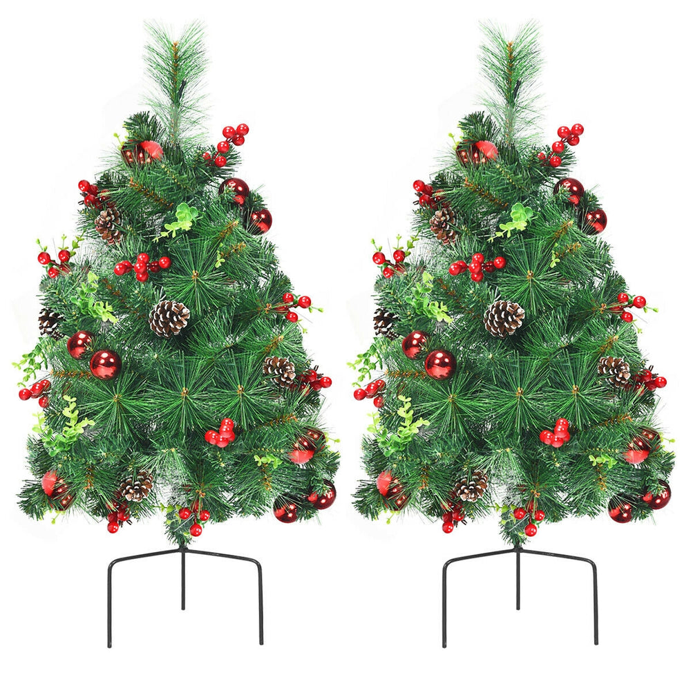Set of 2 pre-lit 29-inch Christmas trees with ornaments, pine cones, and battery-powered design for festive decor.